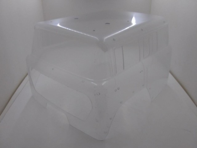 Karosseri leveres ulakkert, vist montert som eksempel